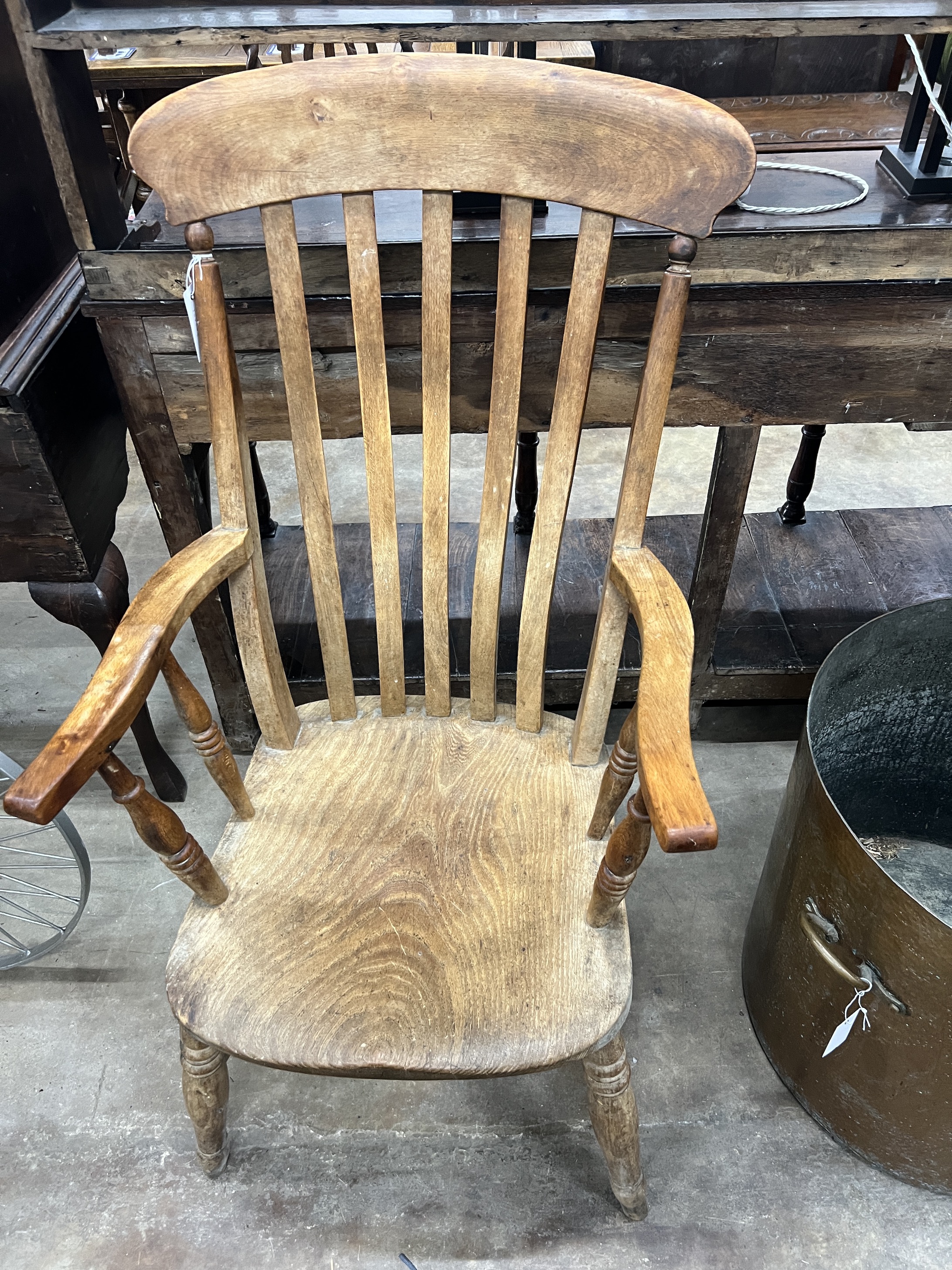 A Victorian elm and beech Windsor lathe back armchair, width 54cm, depth 47cm, height 110cm